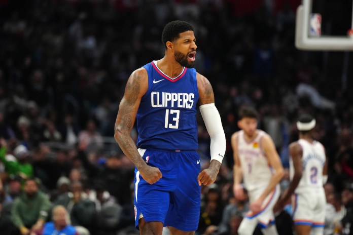 NBA: Oklahoma City Thunder at Los Angeles Clippers LA Clippers forward Paul George celebrates against the Oklahoma City Thunder in the second half at Crypto.com Arena.