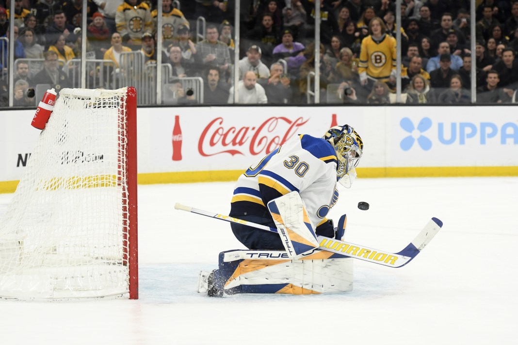 St. Louis Blues goaltender Joel Hofer makes a save during the first period against the Boston Bruins at TD Garden.