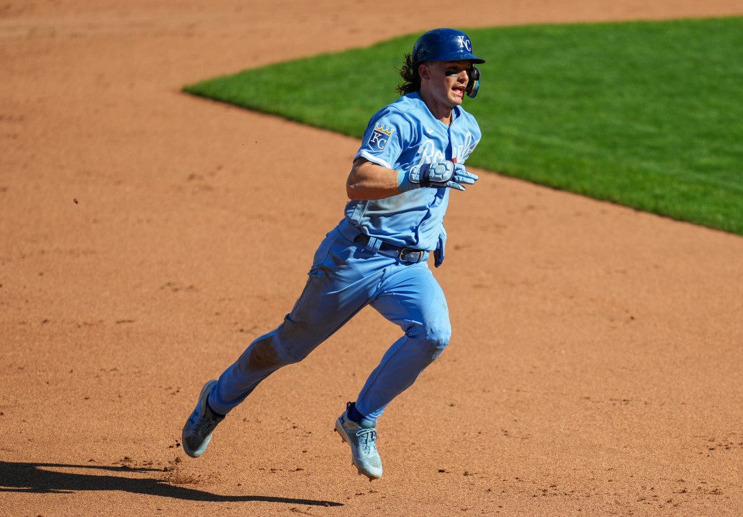 Kansas City Royals shortstop Bobby Witt Jr. (7) runs to third base after hitting a triple during the fifth inning against the New York Yankees at Kauffman Stadium on October 1, 2023.