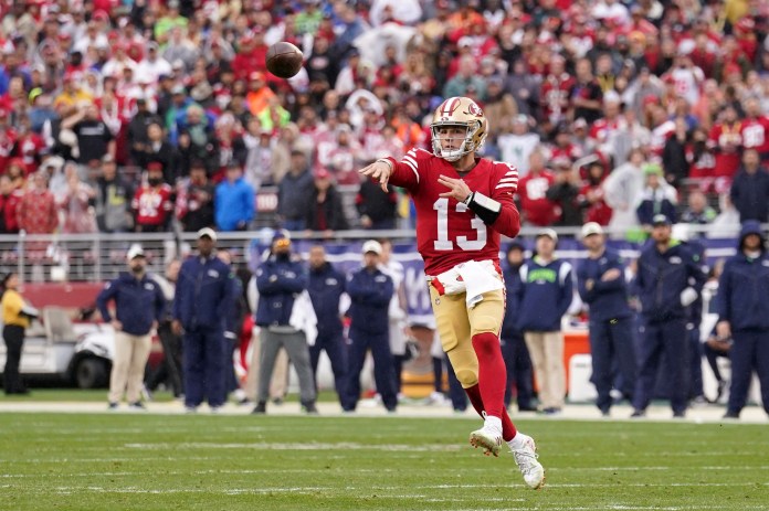 San Francisco 49ers quarterback Brock Purdy (13) throws a pass during the third quarter of the wild card game against the Seattle Seahawks at Levi's Stadium on January 14, 2023.