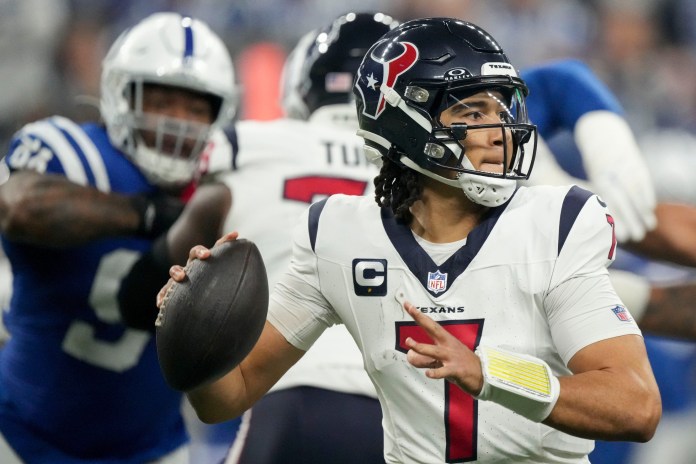 Texans star C.J. Stroud throws a pass against the Colts during the 2023 NFL season.