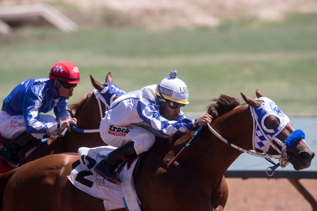 Horse jockey Luis M. Martinez races All Timefav in the Quarter Horse Allowance at Ruidoso Downs Race Track and Casino on September 4, 2023.