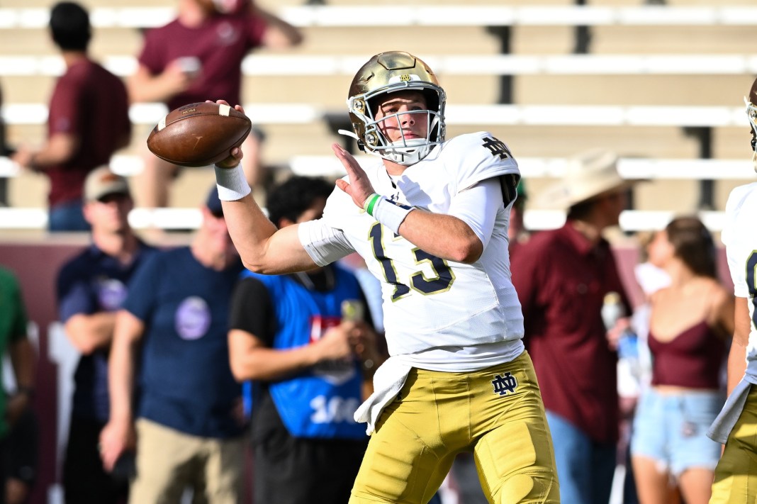 Notre Dame quarterback Riley Leonard (13) warms up before the game against the Texas A&M Aggies at Kyle Field on August 31, 2024.