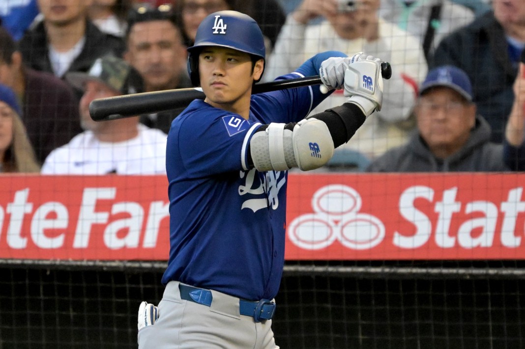 Los Angeles Dodgers designated hitter Shohei Ohtani (17) waits on deck during the third inning against the Los Angeles Angels at Angel Stadium on March 26, 2024.