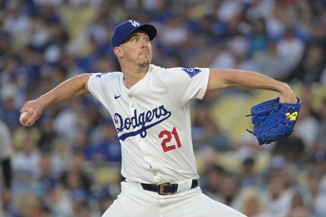 Los Angeles Dodgers starting pitcher Walker Buehler (21) delivers to the plate in the first inning against the Baltimore Orioles at Dodger Stadium on August 28, 2024.
