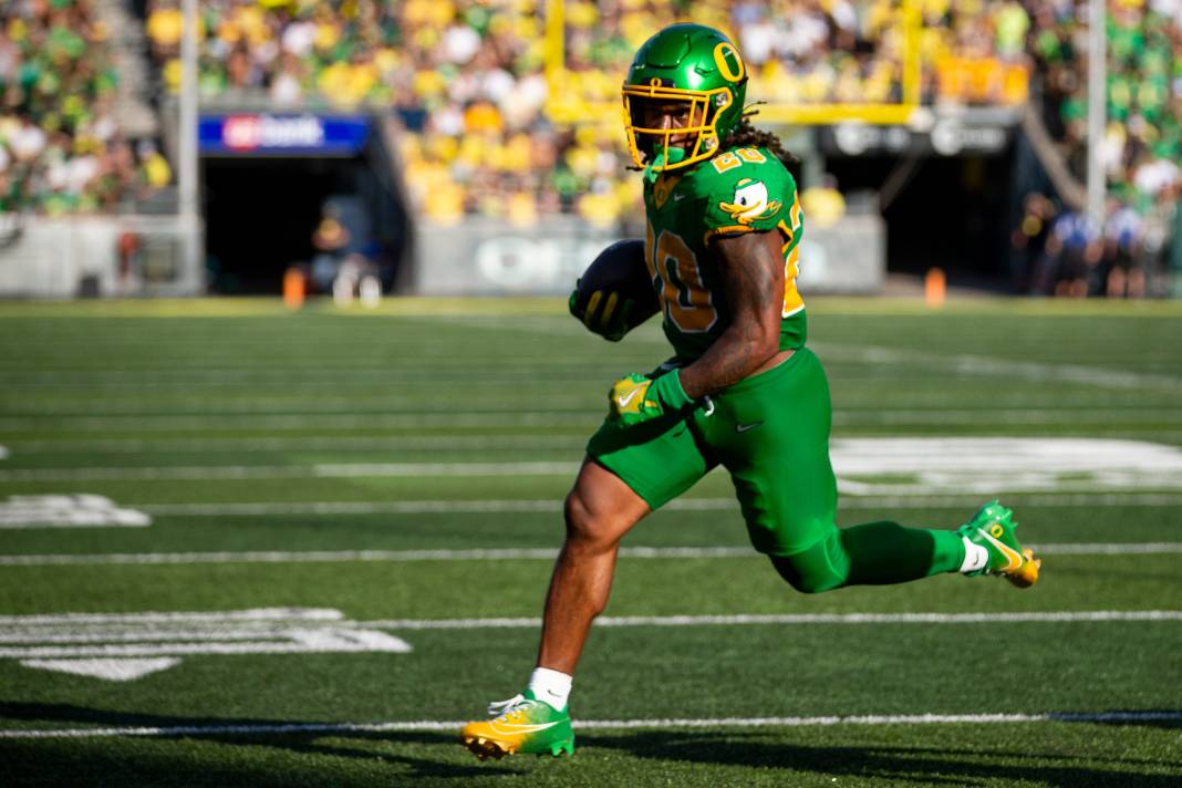 Oregon Ducks running back Jordan James carries the ball into the end zone for a touchdown during the game against the Idaho Vandals at Autzen Stadium in Eugene, Oregon, on August 31, 2024.