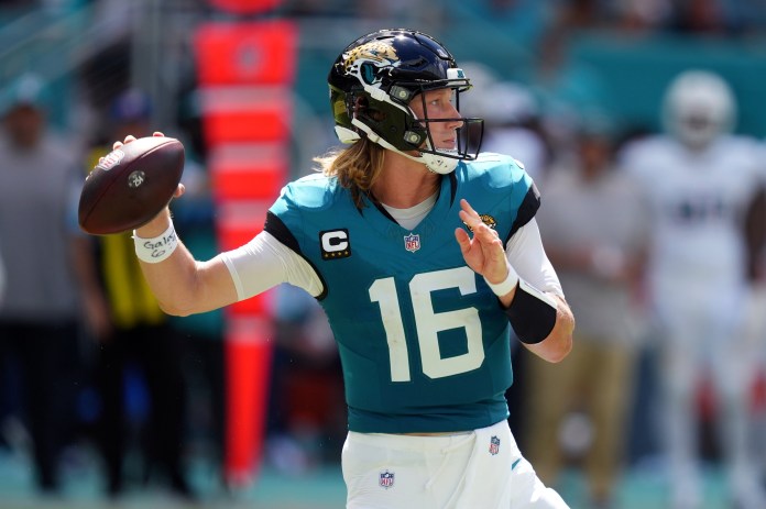 Jacksonville Jaguars quarterback Trevor Lawrence throws a pass against the Miami Dolphins in Week 1 of the 2024 NFL season.