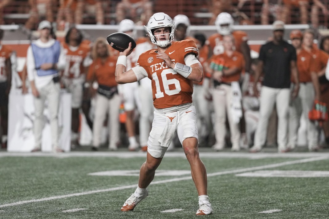 Texas Longhorns quarterback Arch Manning (16) throws a touchdown pass during the second half against the Texas-San Antonio Roadrunners at Darrell K Royal-Texas Memorial Stadium on September 14, 2024.