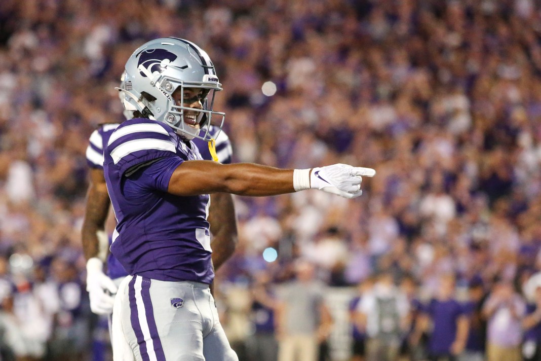 Kansas State Wildcats running back Dylan Edwards (3) celebrates a touchdown in the third quarter against the Tennessee-Martin Skyhawks at Bill Snyder Family Football Stadium on August 31, 2024.
