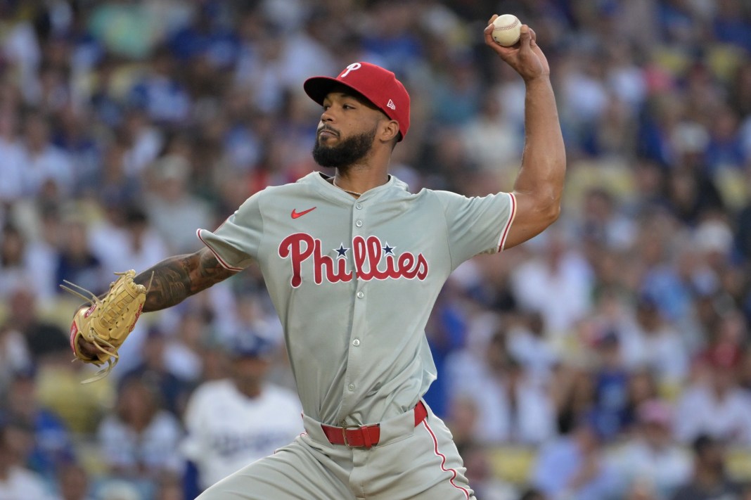 Philadelphia Phillies starting pitcher Cristopher Sanchez (61) delivers a pitch to the plate during the first inning against the Los Angeles Dodgers at Dodger Stadium on August 6, 2024.