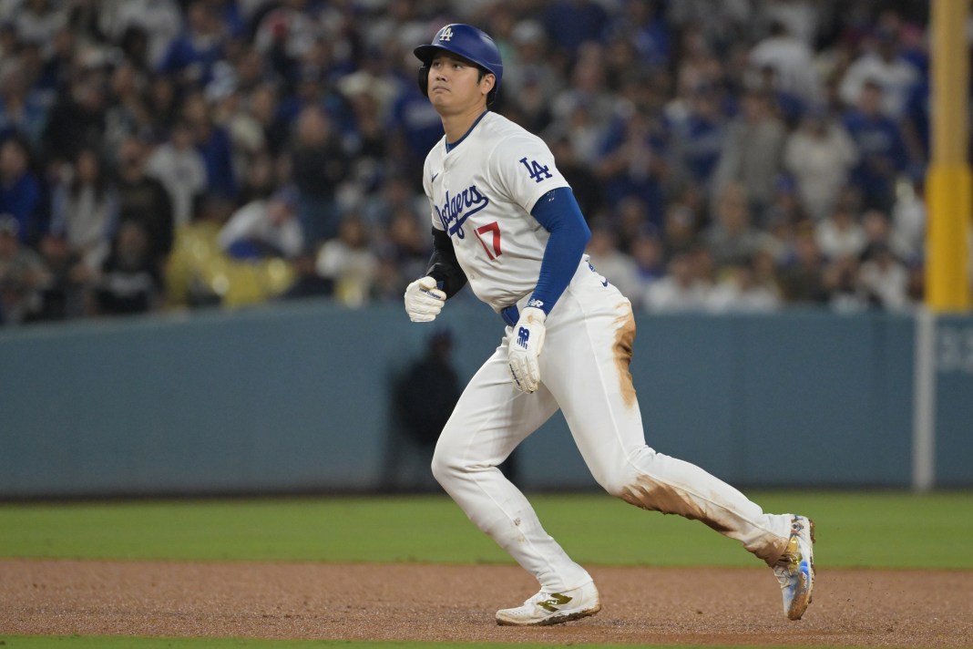 Los Angeles Dodgers designated hitter Shohei Ohtani (17) takes a lead off second base after hitting a double in the eighth inning against the San Diego Padres at Dodger Stadium on September 26, 2024.