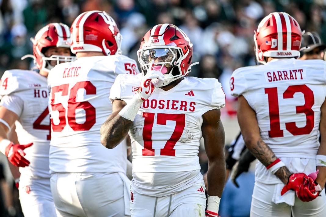 Indiana's Ty Son Lawton silences the crowd after a touchdown run against Michigan State