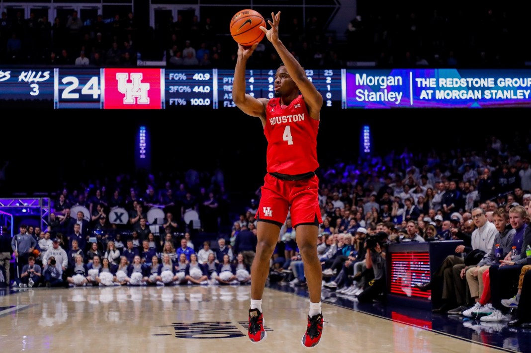 Houston Cougars guard LJ Cryer (4) shoots the ball during the first half against the Xavier Musketeers at Cintas Center on December 1, 2023