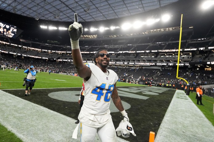 Los Angeles Chargers linebacker Bud Dupree (48) celebrates after the victory against the Las Vegas Raiders at Allegiant Stadium on January 5, 2025.