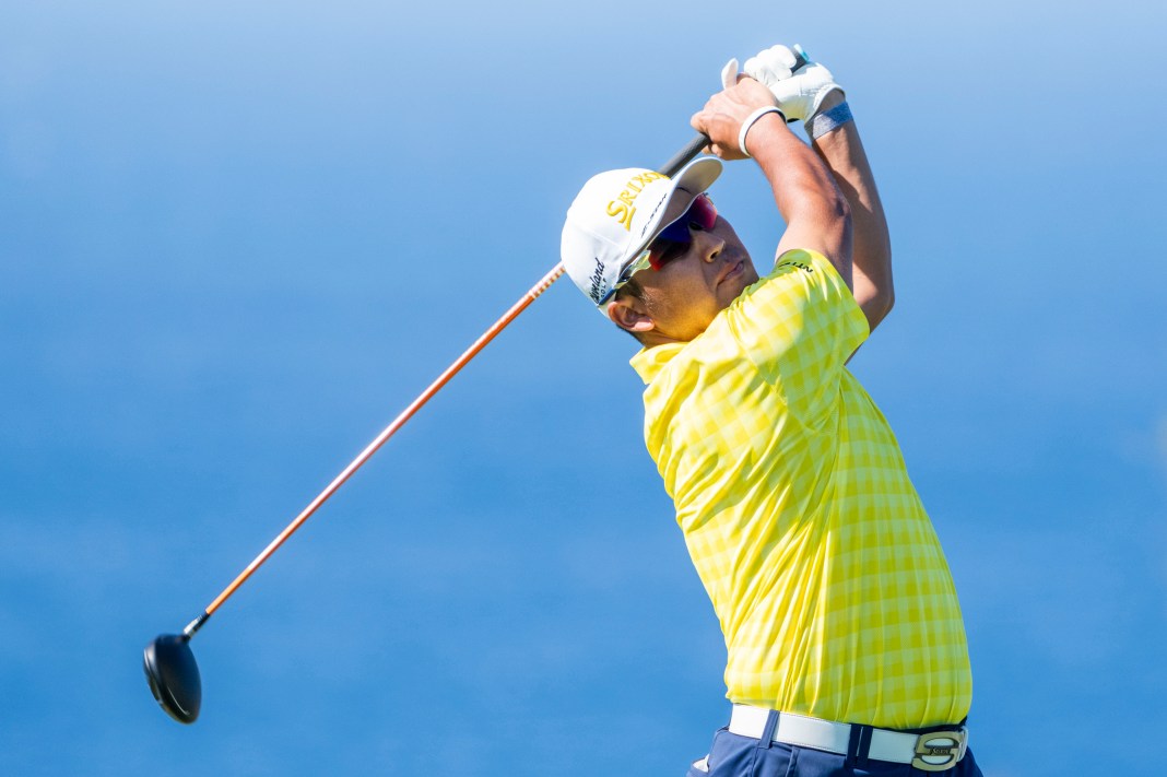 Hideki Matsuyama tees off on the 13th hole during the final round of The Sentry golf tournament at Plantation Course at Kapalua on January 5, 2025.
