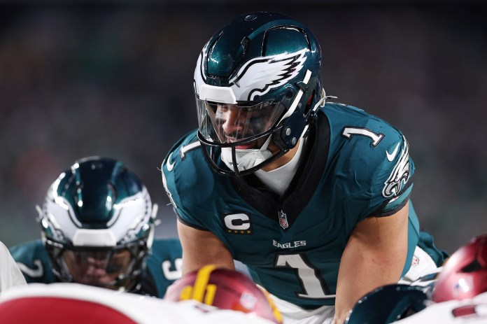 Philadelphia Eagles quarterback Jalen Hurts (1) prepares to snap the ball during the second half of the NFC Championship game against the Washington Commanders at Lincoln Financial Field on January 26, 2025
