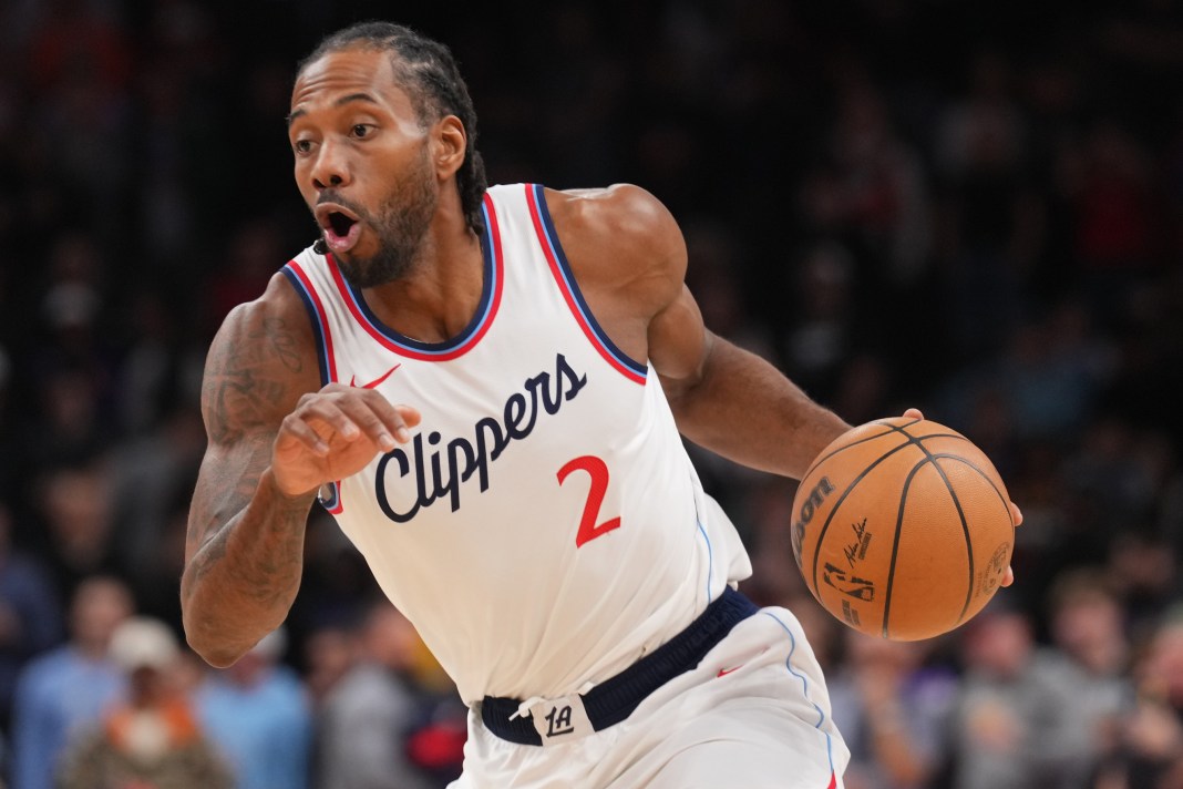 LA Clippers forward Kawhi Leonard (2) dribbles against the Phoenix Suns during the first half at PHX Center on March 4, 2025.