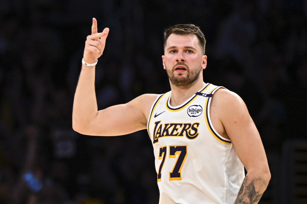 Los Angeles Lakers guard Luka Doncic (77) reacts after scoring against the Chicago Bulls during the first half at Crypto.com Arena in Los Angeles, CA, on March 22, 2025.