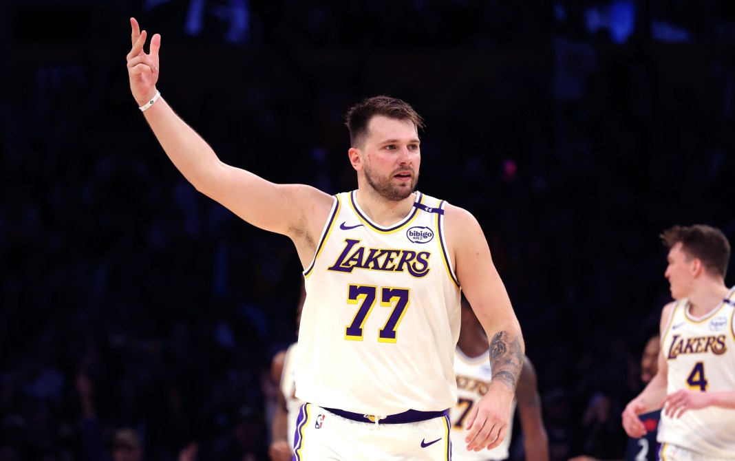 Los Angeles Lakers guard Luka Doncic (77) reacts to a play during the third quarter against the LA Clippers at Crypto.com Arena on March 2, 2025.