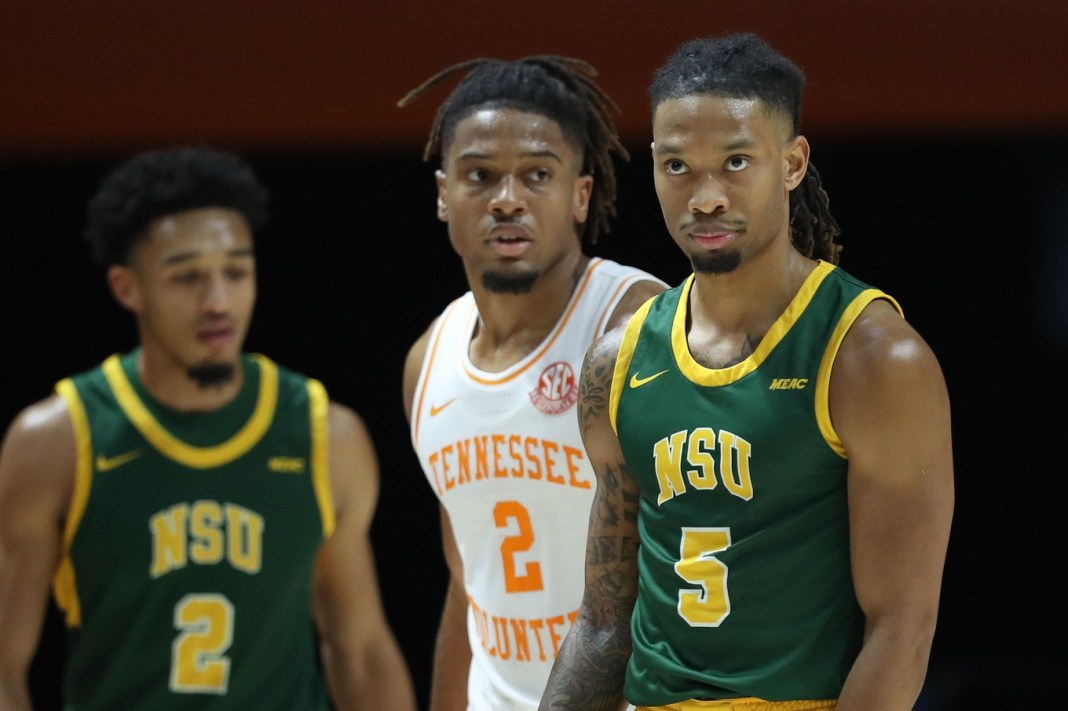 Tennessee Volunteers guard Chaz Lanier (2) and Norfolk State Spartans guard Brian Moore Jr. (5) during the second half at Thompson-Boling Arena at Food City Center on December 31, 2024.