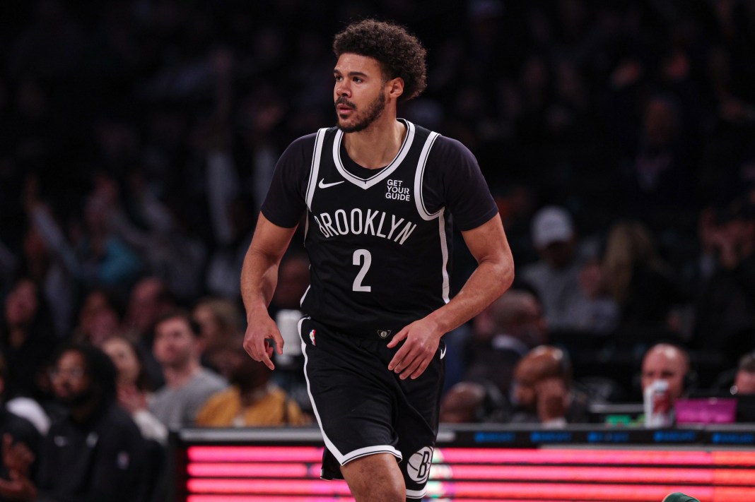 Nets forward Cam Johnson runs the court against the Hawks during the 2024-25 NBA season.
