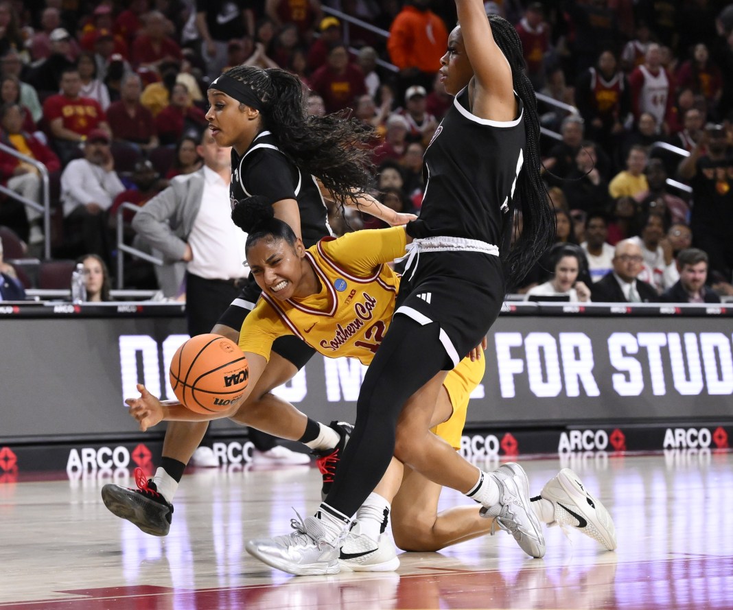 USC Trojans guard JuJu Watkins (12) injures her knee in the first quarter of an NCAA Tournament second-round game against the Mississippi State Bulldogs at Galen Center in Los Angeles, CA, on March 24, 2025.
