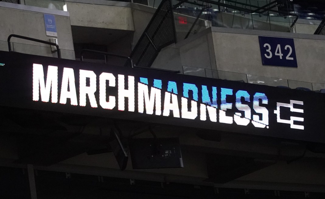 March Madness signs are displayed on Tuesday, March 25, 2025, ahead of the 2025 NCAA Men’s Basketball Midwest Regional at Lucas Oil Stadium in Indianapolis.