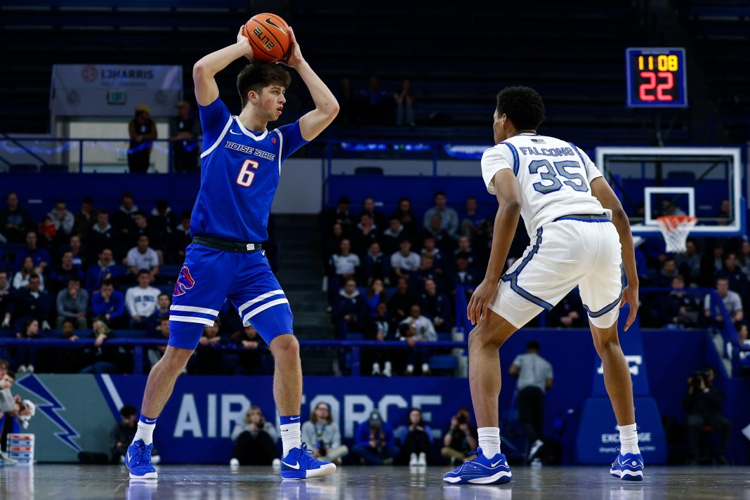 Boise State Broncos forward Pearson Carmichael (6) controls the ball as Air Force Falcons guard Kyle Marshall (35) defends in the second half at Clune Arena on March 4, 2025.