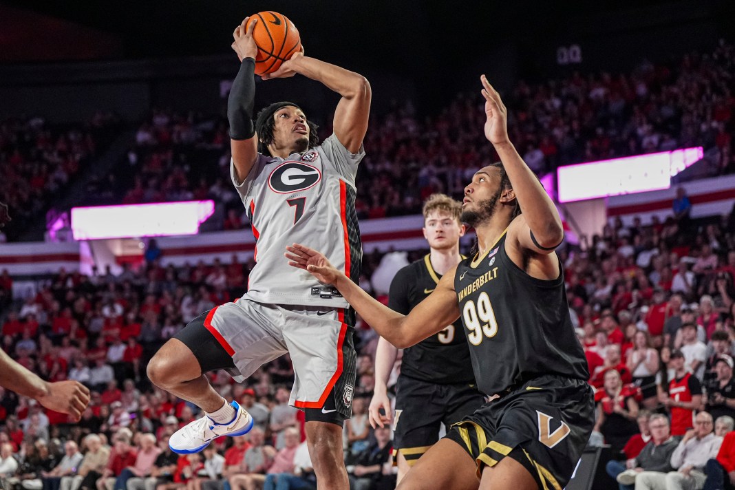 Georgia Bulldogs guard Tyrin Lawrence (7) shoots over Vanderbilt Commodores forward Devin McGlockton (99) during the first half at Stegeman Coliseum on March 8, 2025