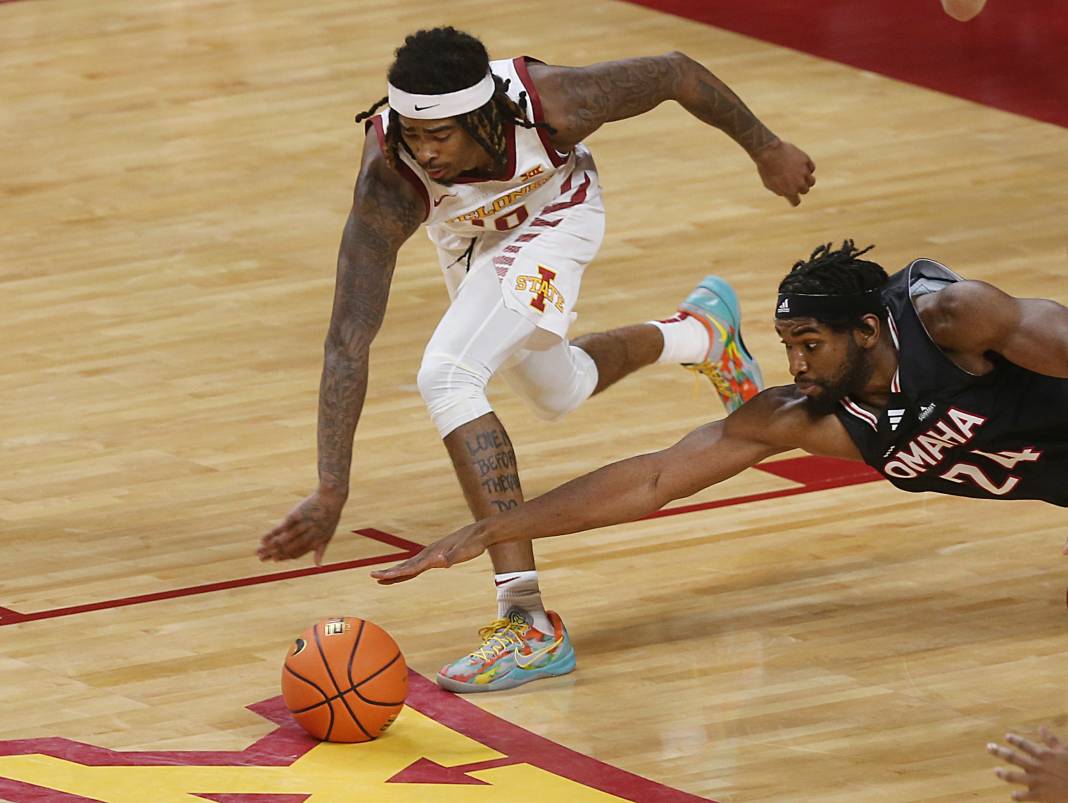 Iowa State Cyclones guard Keshon Gilbert (10) steals the ball from Omaha Mavericks center Isaac Ondekane (24) during the second half of the NCAA men’s basketball game at Hilton Coliseum on December 15, 2024, in Ames, Iowa.