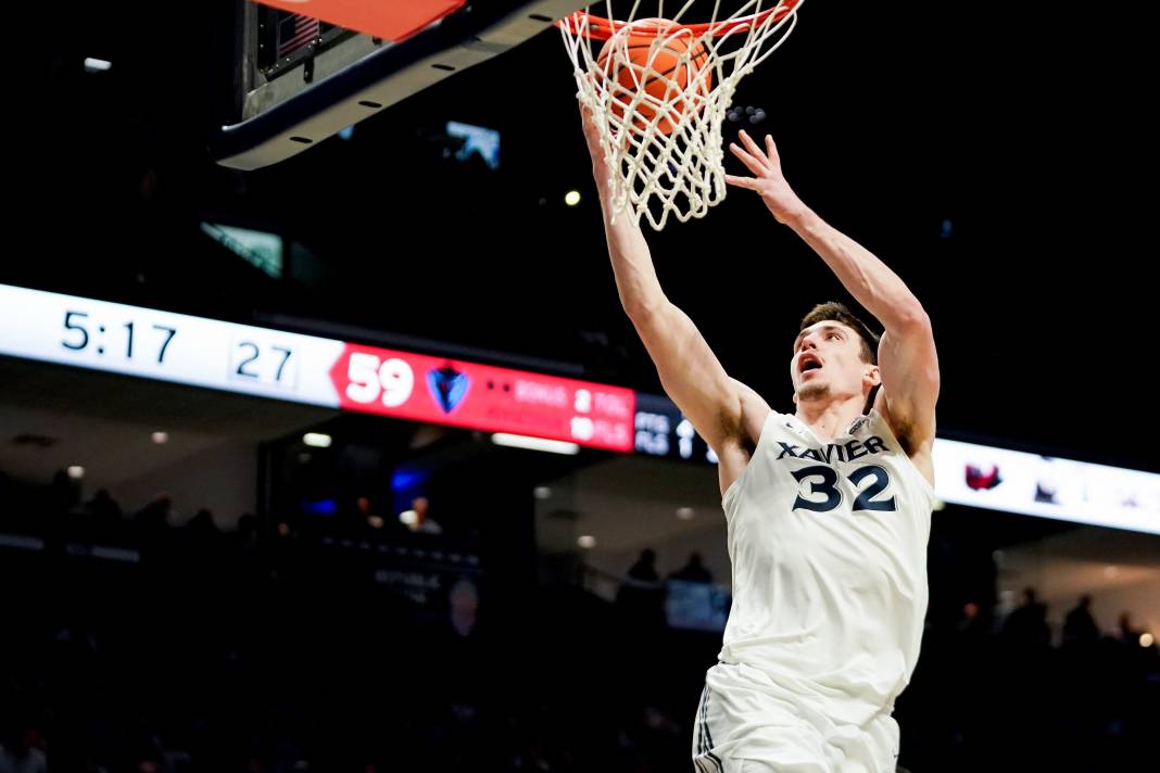 Xavier Musketeers forward Zach Freemantle (32) hits a layup in the second half of a NCAA men’s basketball game between the Xavier Musketeers and DePaul Blue Demons on February 15, 2025, at Cintas Center in Cincinnati. The Musketeers won 85-68.