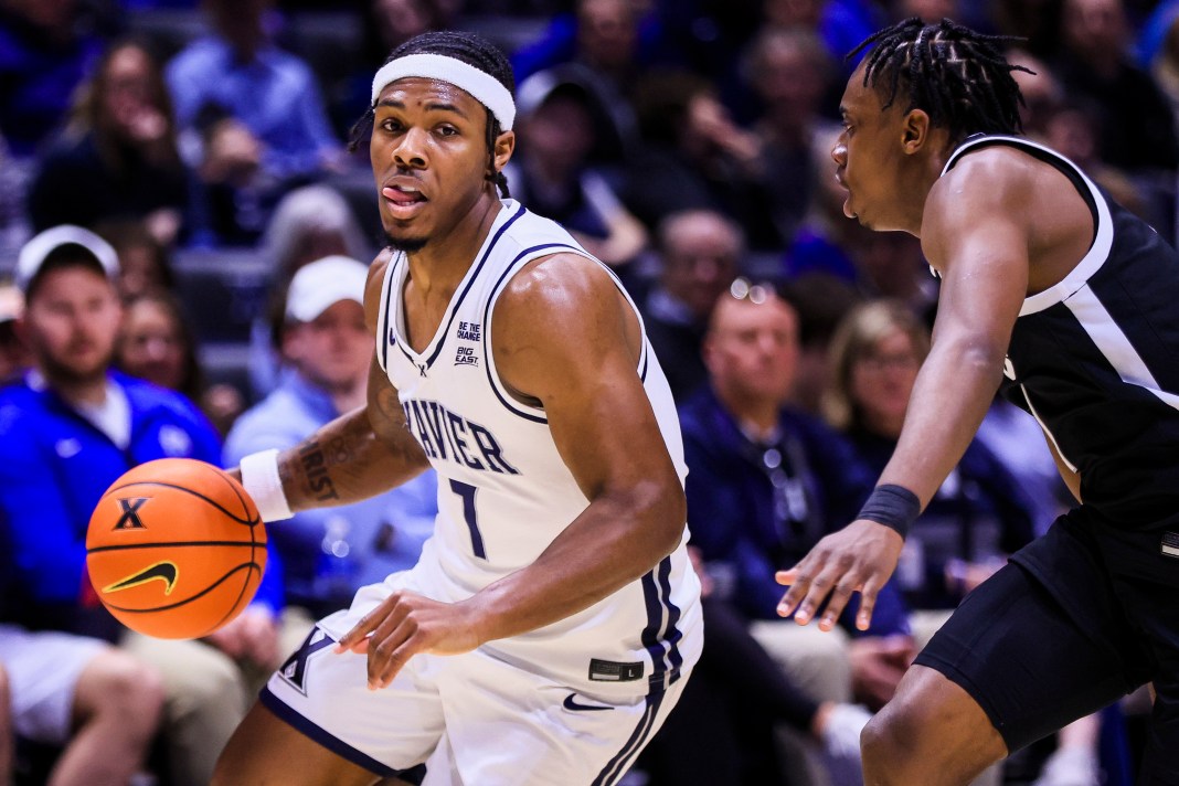 Xavier Musketeers guard Ryan Conwell (7) dribbles against the Providence Friars in the first half at Cintas Center on March 8, 2025.